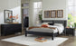 Danziar King Panel Bed with Mirrored Dresser, Chest and Nightstand