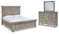 Harrastone King Panel Bed with Mirrored Dresser