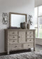 Harrastone King Panel Bed with Mirrored Dresser