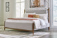 Lyncott Queen Upholstered Bed with Mirrored Dresser and Nightstand